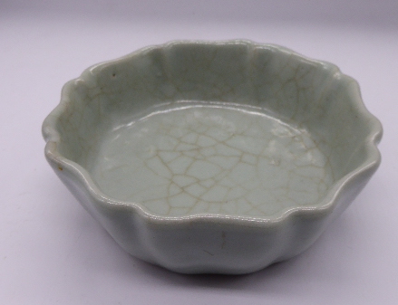A Chinese celadon glazed brush washer, seal mark to base, H.16cm
