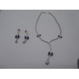 18ct white gold necklace and earring set, mounted with diamonds and amethyst.