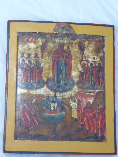 A Russian icon of the Theotokos with Christ Child, surrounded by Saints, tempura on panel, yellow