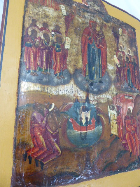 A Russian icon of the Theotokos with Christ Child, surrounded by Saints, tempura on panel, yellow - Image 2 of 2