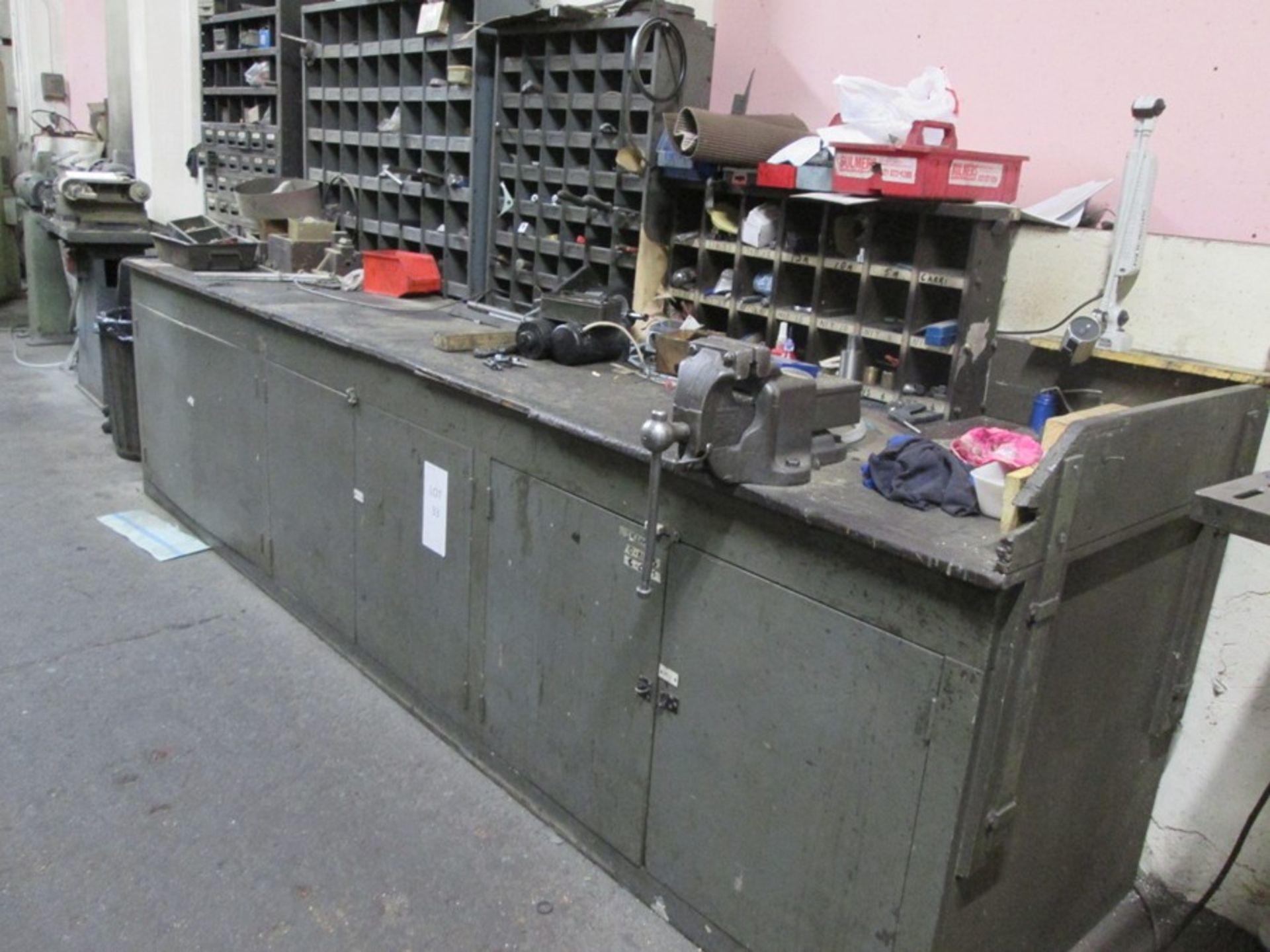 Wooden Assembly Bench with pigeon hole storage and bench vice