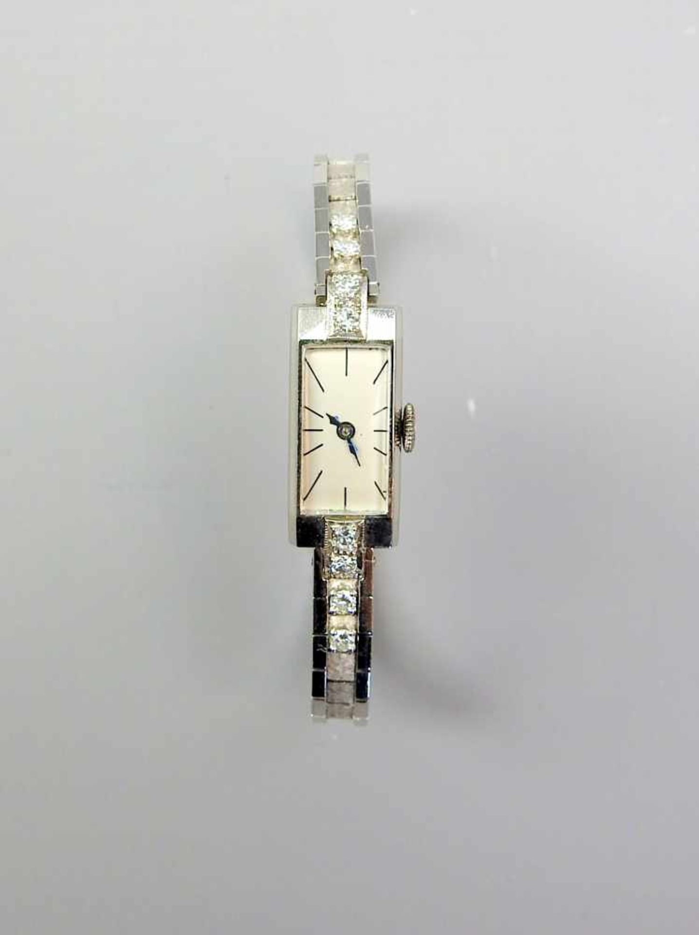 Feine Damen-Armbanduhr18 K. Weißgold, mit Besatz von 8 Brillanten. Feine Qualität. 1950er- Jahre.