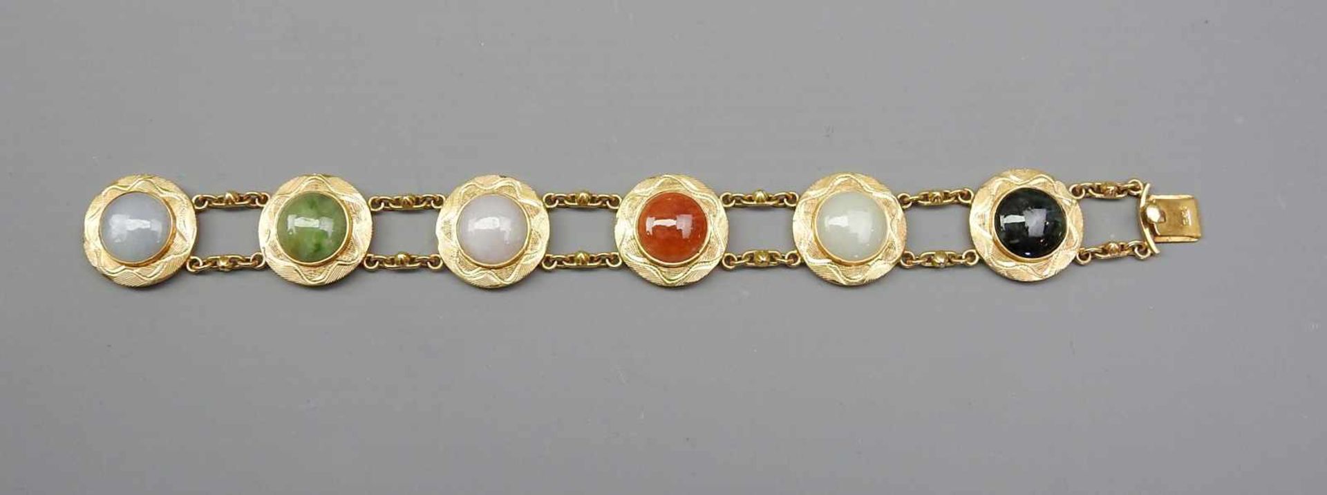 Farbstein-Armband18 K. Gold, mit verschiedenen Farbsteinen und feiner Gravur. Wohl Osmanisch, 80er