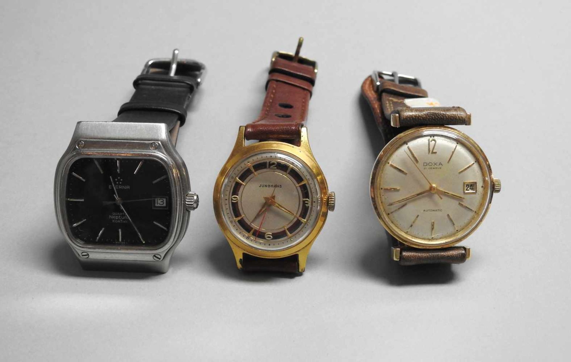 Drei Armbanduhren14 K. Gold. Drei Uhren der Marken Eterna, Junghans, Doxa. Deutschland und