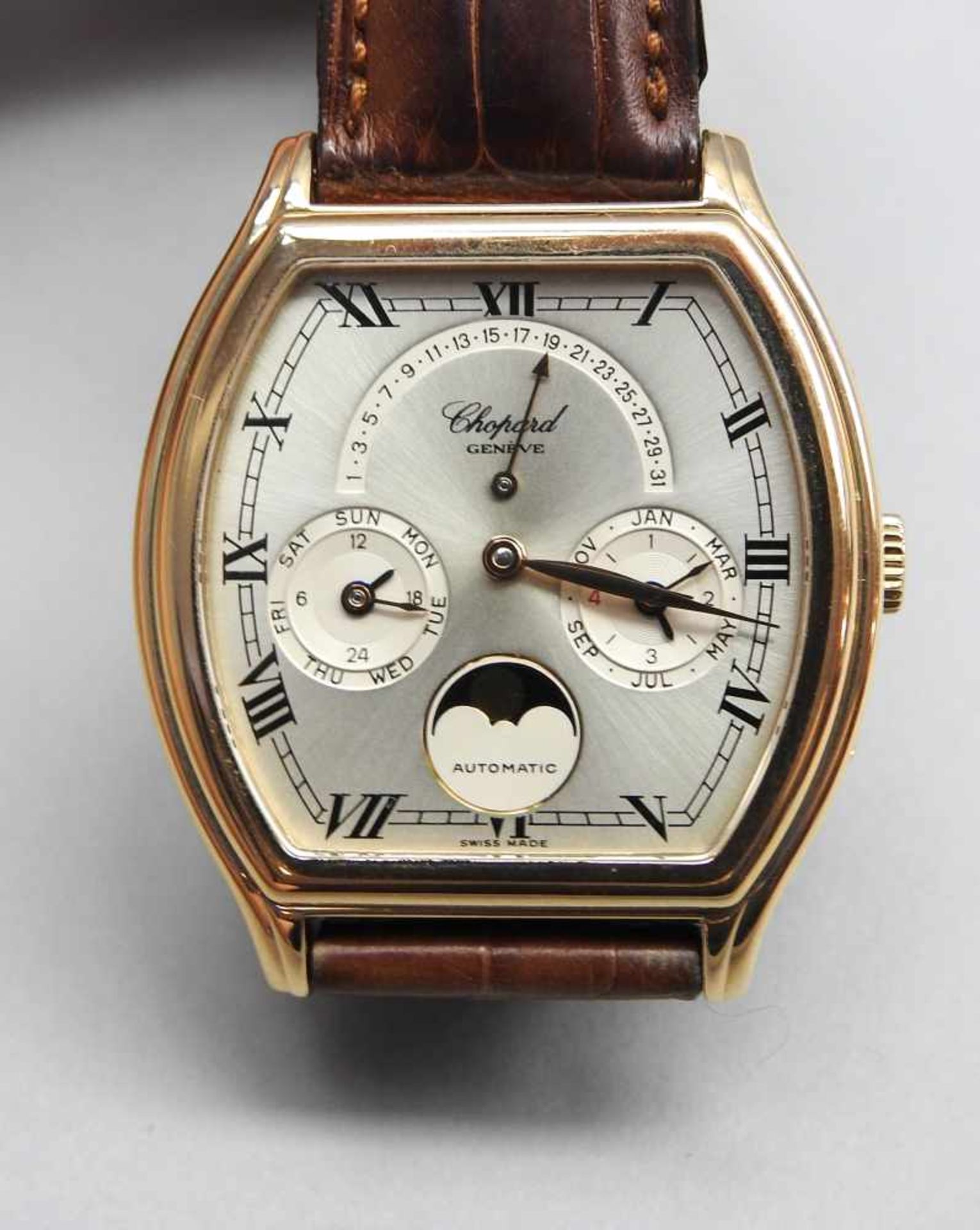 Chopard, Herren-Armbanduhr18 K. Roségold, mit braunem Krokolederarmband. Modell LunáDoro, Tonneau-