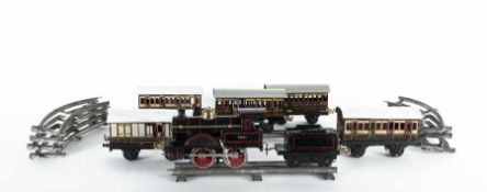BingSpielwarenhersteller in NürnbergModelleisenbahnMetall, lackiert; H 9 cm; Lokomotive, 6 Anhänger,