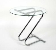 Designer of the second half of the 20th centurySide tableTubular steel, curved, with glass top; H 51