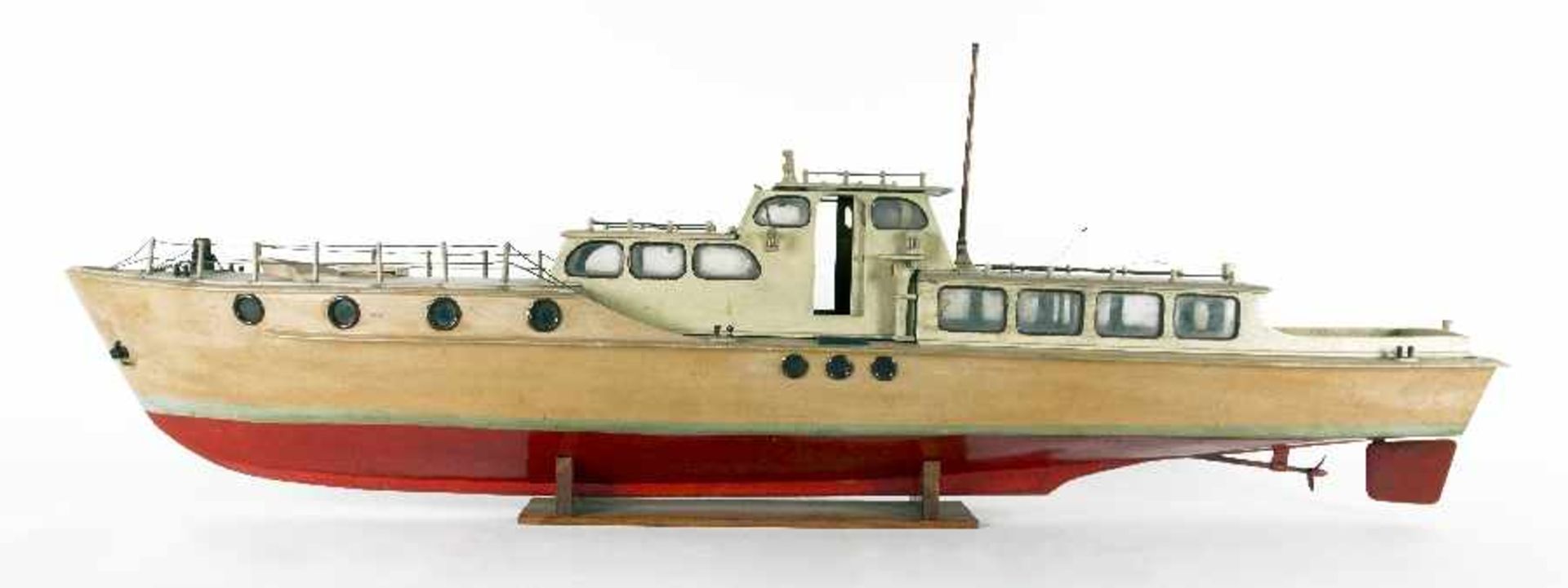 Germany, mid-20th centuryModel of a motor yachtWood, lacquered, metal, plastic; formerly