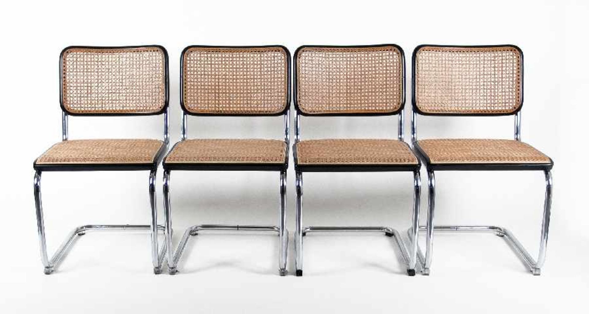 Marcel Breuer1902 - 19814 cantilever S32Chromed tubular steel, painted wood with wicker; Design