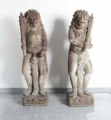 Bali / IndonesiaA pair of demons as guardian figuresCast stone, finished by hand; H each 124 cm; old