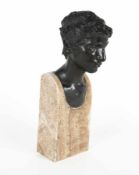 Hans Stoltenberg-Lerche1867 - 1920Young man with flower in the hairBronze on marble base; H 54 cm;