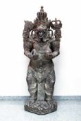 Bali / IndonesiaFour-armed statue of a godCast stone, finished by hand; H 162 cm; old weather-