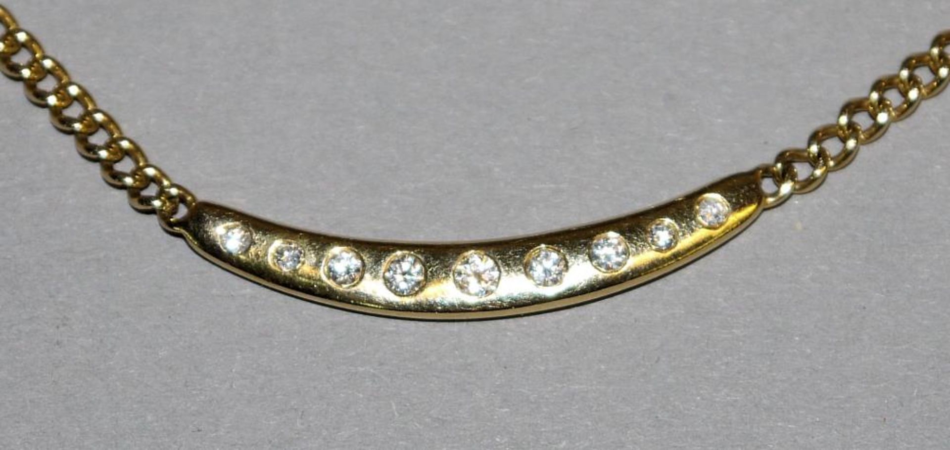 Collier mit Brillanten, Gold 18kt Gelbgold, besetzt mit 9 Brillanten von zus. 0,28 ct (eingr.), 12, - Bild 2 aus 2