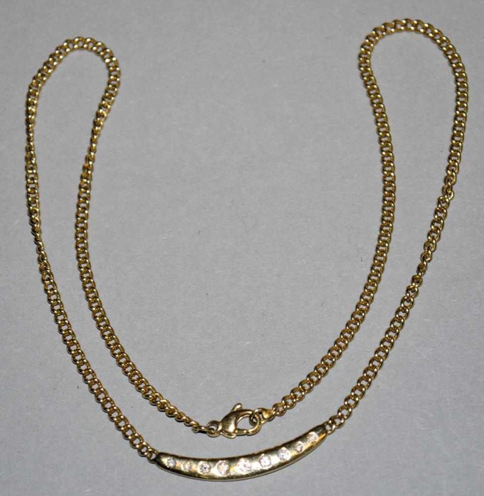 Collier mit Brillanten, Gold 18kt Gelbgold, besetzt mit 9 Brillanten von zus. 0,28 ct (eingr.), 12,