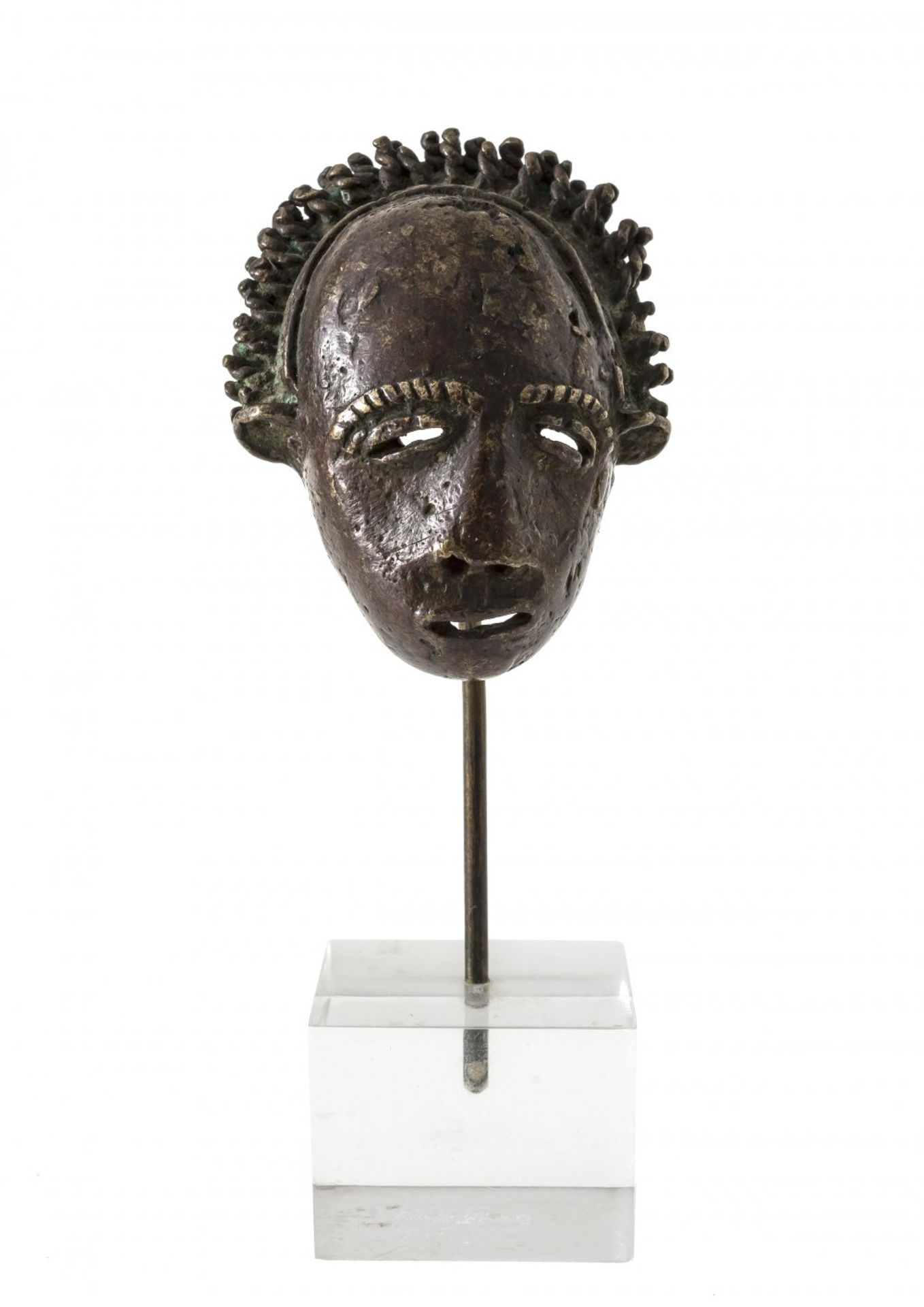 Kleine MaskeAshanti, Ghana. Messingguss. H. 4,8 cm.A small brass maskAshanti. Ghana. H. 4,8