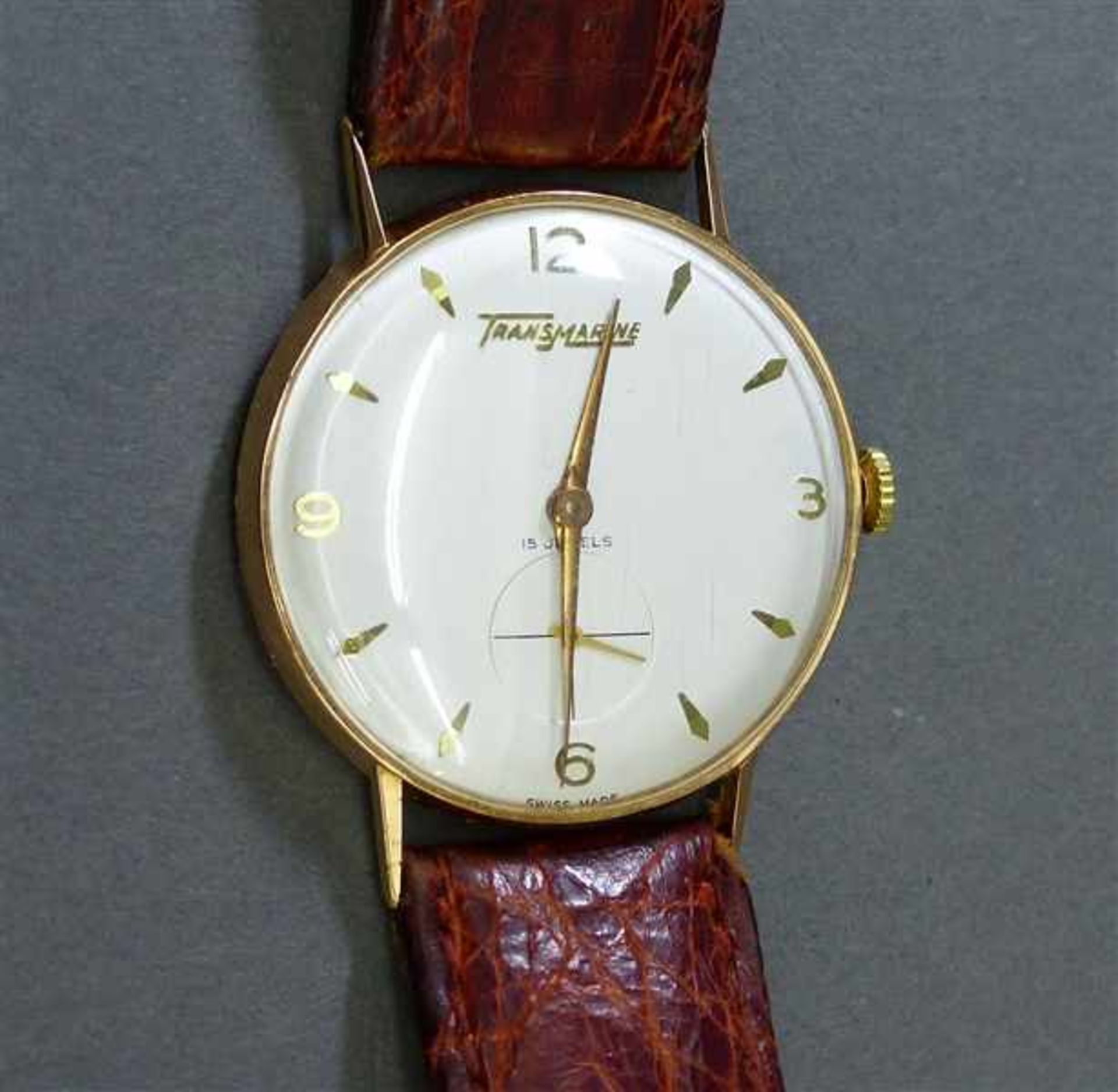 Vintage-Armbanduhr18 kt. Rotgold, 70er Jahre, "Trans Marine", Tramelan Swiss, Handaufzug, dezentrale