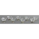 8 Dessertschalen835er Silberfuß, Blumendekor, durchbrochen gearbeitet, facettiertes Kristallglas,