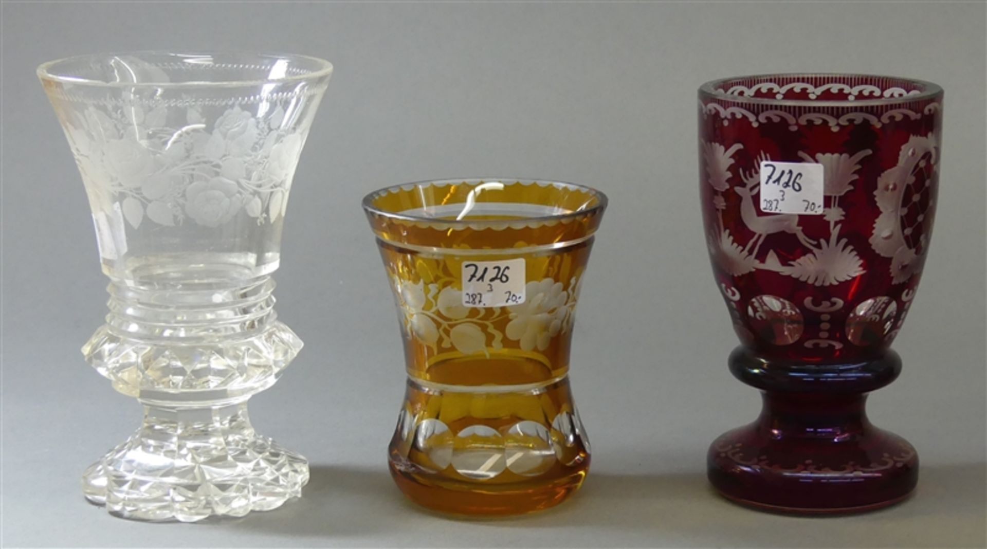 Konvolut3 Pokale, Kristallglas, 1 x rubinrot, 1 x amber, 1 x klar, geschliffen, verschieden,