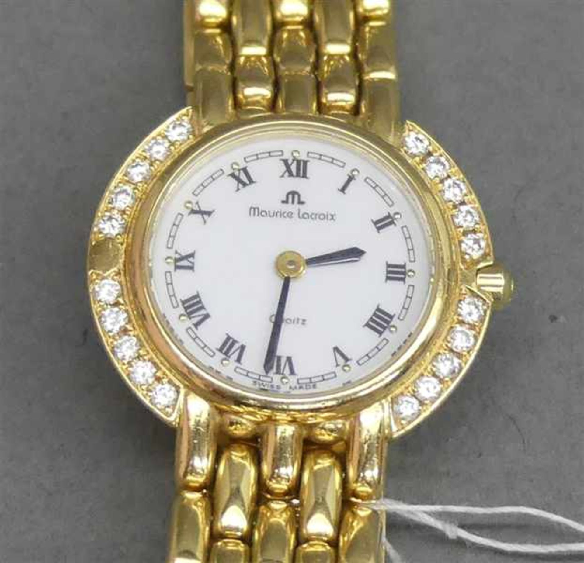 Damenarmbanduhr18 kt. Gelbgold, "Maurice Lacroix", Lünetet mit 20 Diamanten besetzt, zus. ca 0,40 - Image 2 of 2