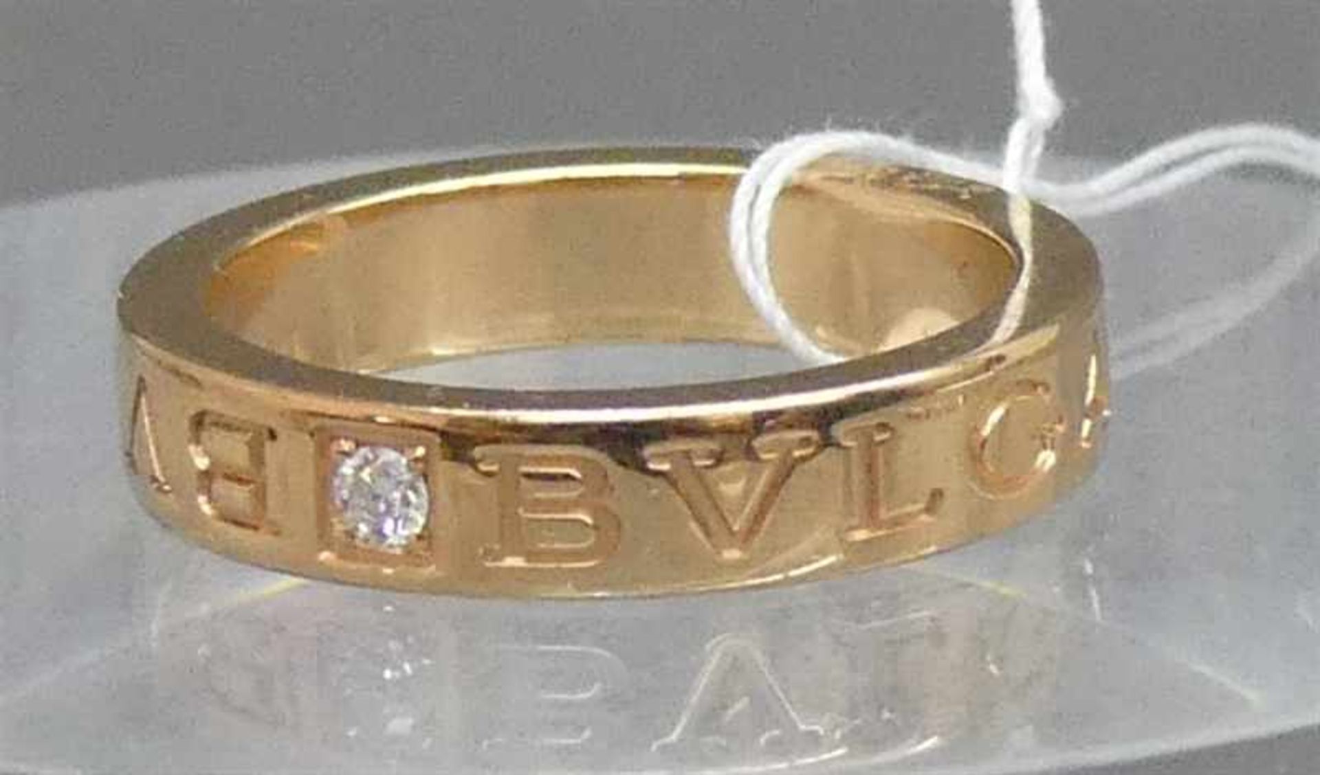 Bulgari Ring18 kt. Rosegold, 1 Brillant ca 0,05 ct., punziert und nummeriert, Original, ca 7g, RM