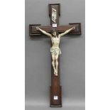 KruzifixChristus am Kreuz, Holz, gefasst, 19. Jh., Dreinageltypus, Korpushöhe 29 cm,- - -20.00 %