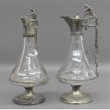 Paar Schenkkannenfarbloses Glas, beschliffen, reiche aufwändige Metallmontur, versilbert, um 1880,
