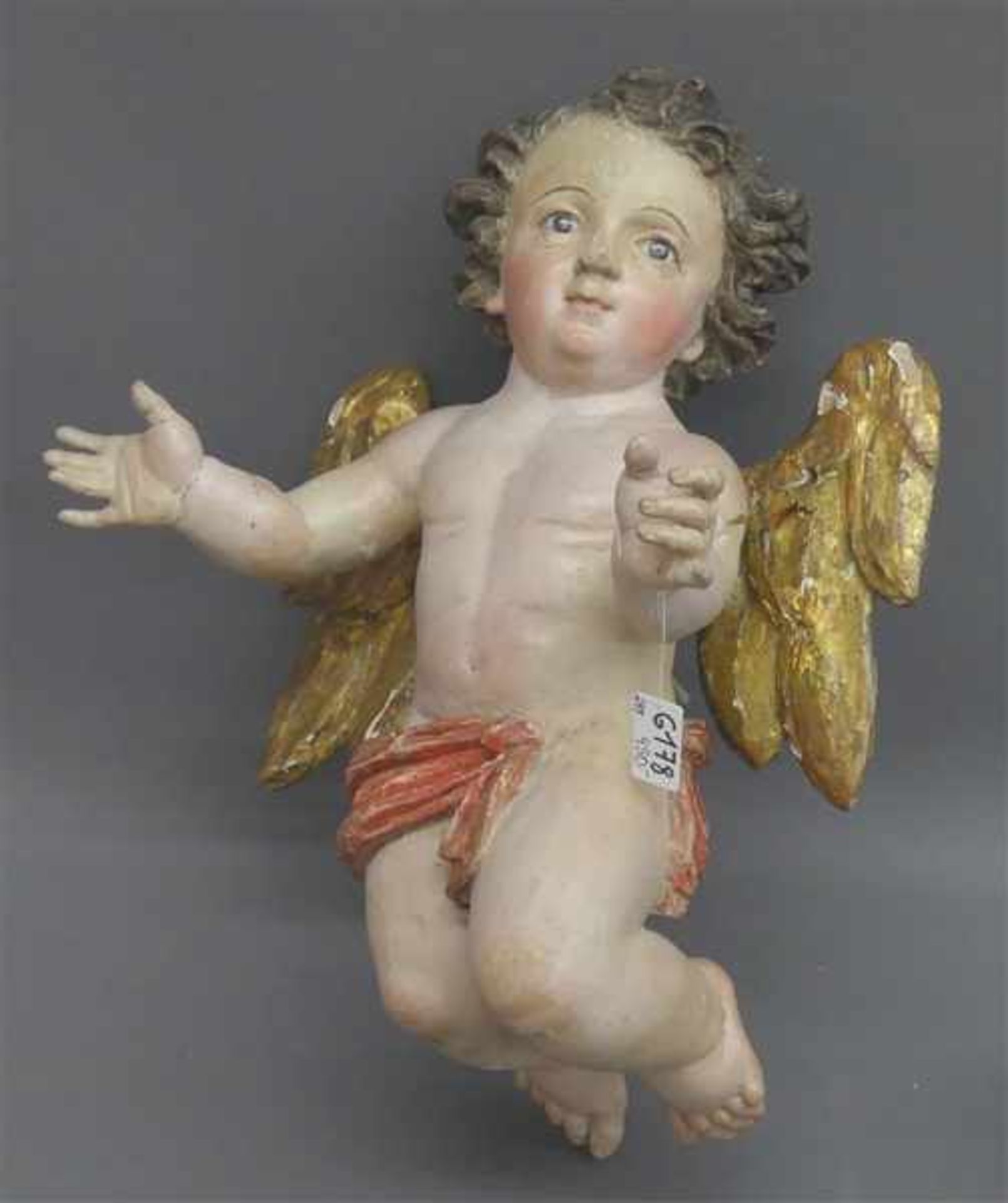 HolzskulpturBarock, Italien, 18. Jh., segnende geflügelte Puttoskulptur, gefasst, Glasaugen, h 40