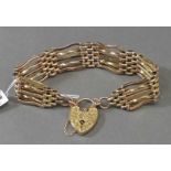 ArmbandEngland, um 1900, 9 kt. Rotgold, durchbrochen gearbeitet, Herzschloss mit Sicherung, ca 19g,-