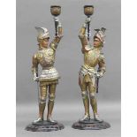 Paar KerzenträgerMetallskulpturen, bemalt, Männer in Ritterrüstungen mit Beil und Degen, um 1860, je