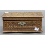 Holzschatullebeschnitzt, um 1920, h 10 cm, b 23 cm, t 12,5 cm,- - -20.00 % buyer's premium on the