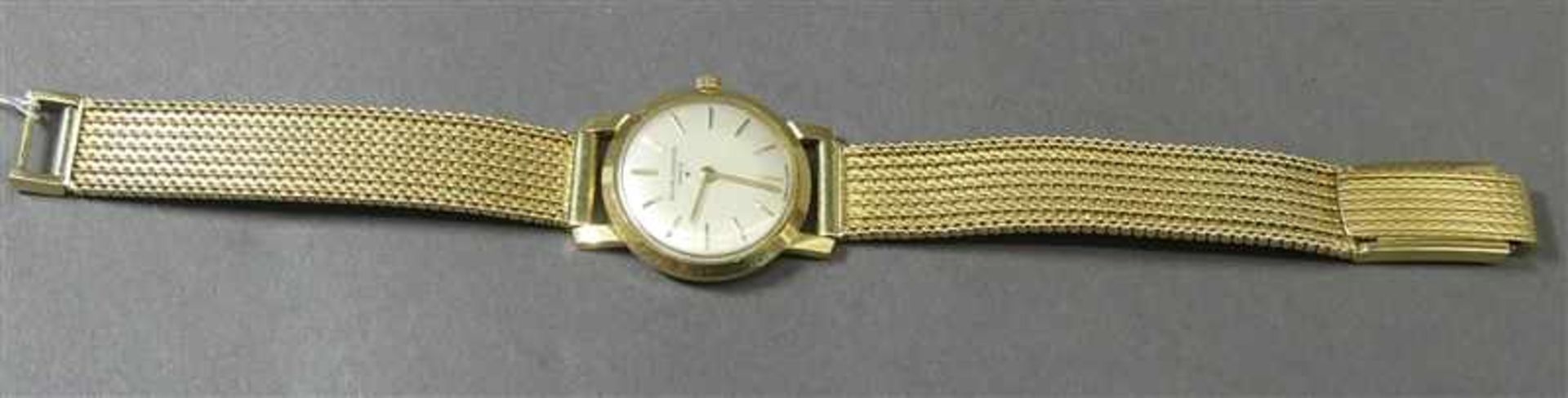 Damenarmbanduhr 14 kt. Gelbgold, "Baume & Mercier", Handaufzug, Milanesearmband, weißes Zifferblatt,