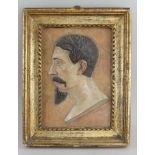 Napoleon III, Halbprofil, Terracotta, gerahmt, besch., 56x43cm- - -24.00 % buyer's premium on the