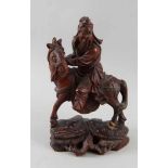 Orientalischer Reiter zu Pferd, Holz geschnitzt, besch., H 25 cm- - -24.00 % buyer's premium on