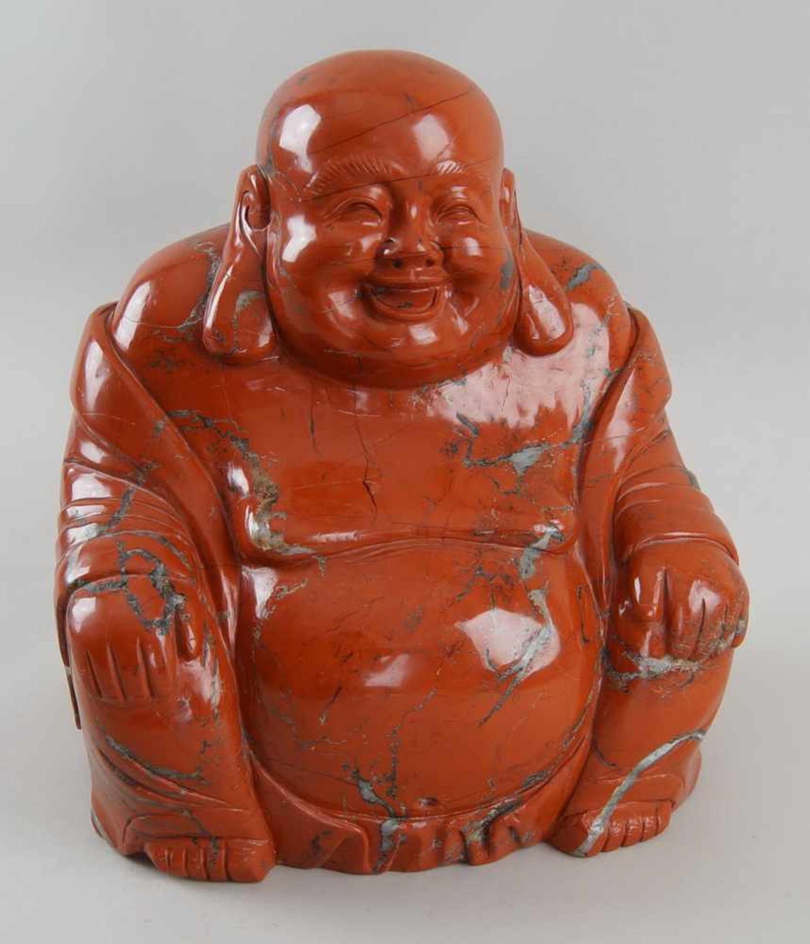 Sitzender Buddha aus Rodonit, H 30 cm- - -24.00 % buyer's premium on the hammer price19.00 % VAT