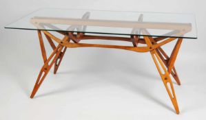 Tisch "Reale" von Carlo MollinoWohl Esche, teakfarben gebeizt. Skelettartiges Gestell aus