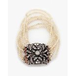 Belle Epoque-Perlarmband mit großer DiamantschließeUm 1870. Silber, teilw. mit Roségold doubliert.