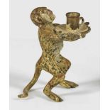 Miniaturfigur eines Affen als DienerWiener Bronze. Bemalung ber.; H. 3,8 cm.A painted Vienna