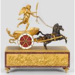 Große Empire-FigurenpenduleBronze, vergoldet bzw. dunkel patiniert sowie bordeauxroter Marmor.