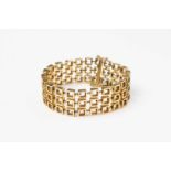 Gliederarmband18 kt Gelbgold. Geschmeidiges Band aus quadratischen Ringgliedern mit länglicher