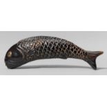 An umimatsu netsuke of a carp. 19th centuryThe scaly body slightly curved. The eyes double inlaid in