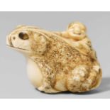 An ivory netsuke of a toad with Tekkai Sennin's soul. Early 19th centuryA huge toad exhaling