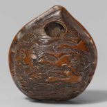 A small walnut netsuke of wild geese. 19th centuryCarved to one side with a flock of geese flying