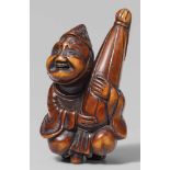 A boxwood netsuke of a court servant (eji). First half 19th centurySquatting, and holding a closed