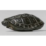 A black wood netsuke of a tortoise. 19th centuryWith head emerging from underneath the carapace, the