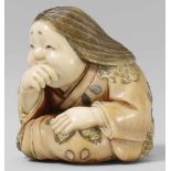 A fine Tokyo school inlaid ivory netsuke of an Okame, by Yasuyuki. Around 1900Giggling, dressed in a