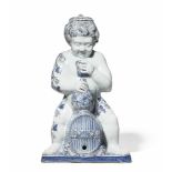 A faience model of Bacchus on a barrelA large two-piece table fountain, the top of the head