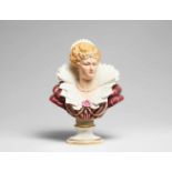 A Meissen porcelain bust of a ladyBust of a lady in pearl jewellery on a round Neoclassical socle,