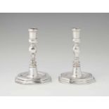 A pair of Mallorcan silver candlesticksBaluster form shafts issuing from square bases. H 17 cm,