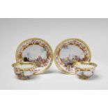 A pair of Meissen porcelain tea bowls with "kauffahrtei" scenesWith original saucer. Painted with