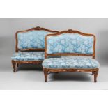 A pair of German walnut canapésModern textile covers. Restored. H 108, W 125, depth of seats 65
